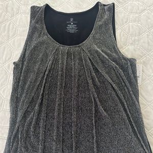 Sleeveless shirt with sparkle